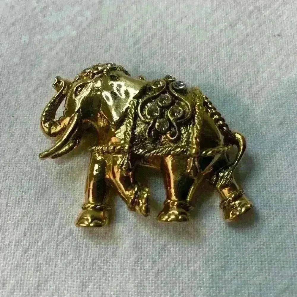 Vintage elephant, brooch, gold with bezel set rhinestones